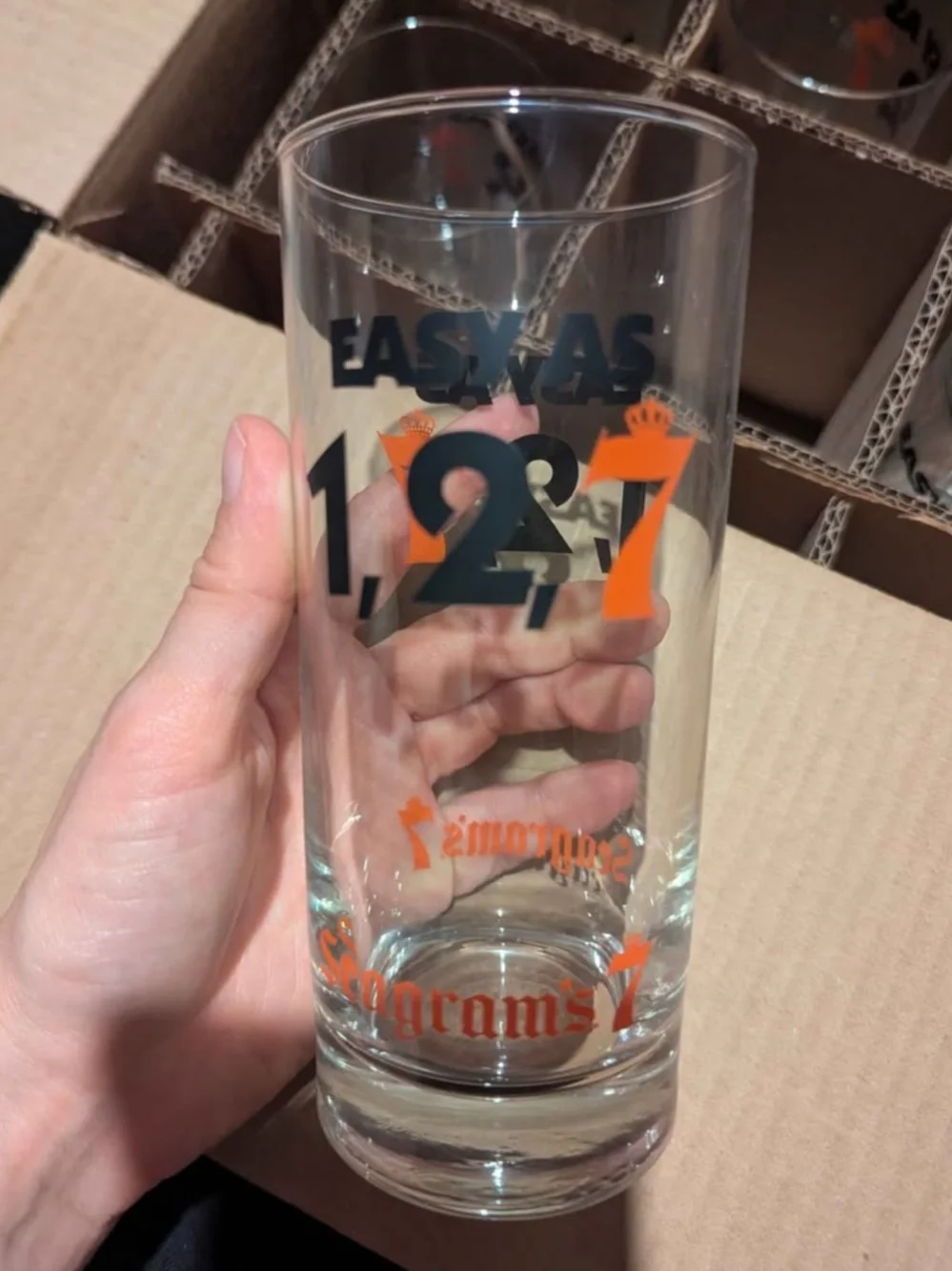 1-2-7 Tall Glass - Clear with Black & Orange Logo